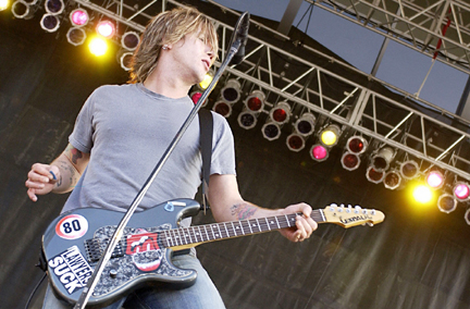 Schmitt was granted an all-access pass in the pit to shoot a Goo Goo Dolls rock concert during Long Beach Grand Prix festivities in April 2002. This photo of lead singer and guitarist John Rzeznik is an example of how a photojournalist can capitalize on close proximity.