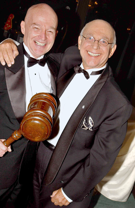 Honorary Mayor Gavin MacLeod (right) celebrates with Brad Lusk, the new Chamber of Commerce president, at last Thursday's installation dinner.