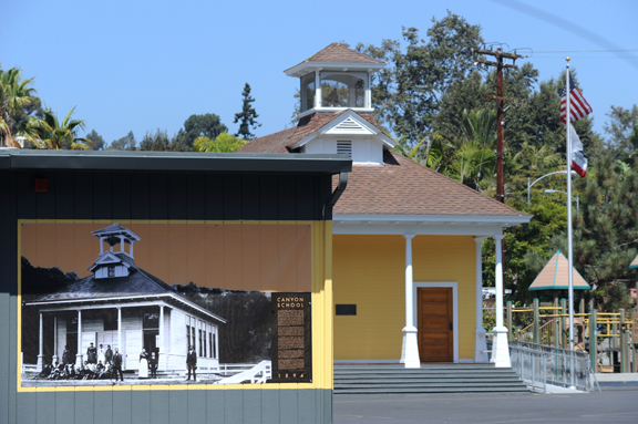 One of four new photographic murals adorning the walls at Canyon Elementary shows the original one-room schoolhouse, established in 1894, which is now the school library. The building was moved from its original location on Sycamore Road in the late 1980s.