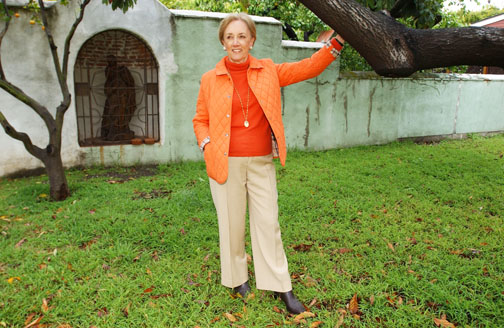 Colleen McAndrews Wood stands in front of San Lorenzo niche and the adobe wall that protects the 170-year-old Pascual Marquez family cemetery in Santa Monica Canyon. Rich Schmitt/Staff Photographer