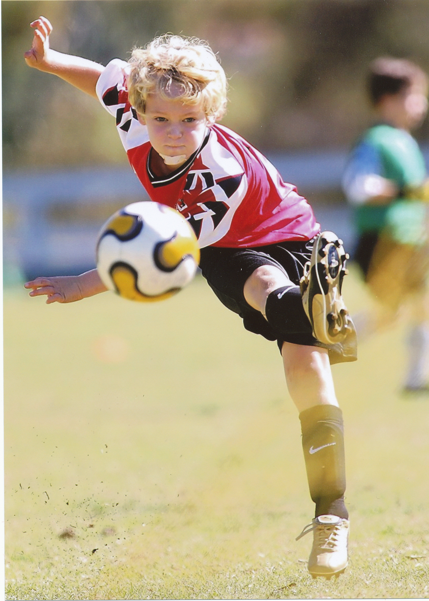 Eight-year-old Miller Moss is one of the finest young athletes in Pacific Palisades, showing skill in soccer, football and basketball. Photo courtesy of Emily Kovner