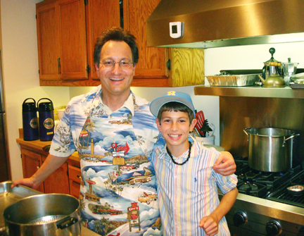 Steve Mindel and son Jake in the kitchen. Mindel estimates the family has spent more than 200 hours putting together the book 