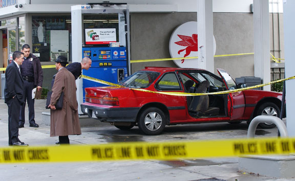 Members of the Los Angeles Police Department, detectives and the LA County coroner were all at the Mobil station at Sunset Boulevard and Swarthmore Avenue on Monday morning, investigating the death of Yolanda Martinez.