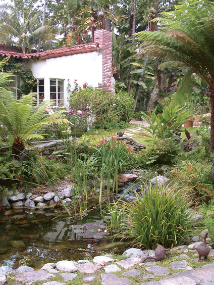 The garden at Hacienda Mojica features many rare plants and a pond. Photo by Dick Orton