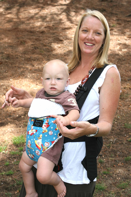 Palisadian Kelsey Clark carries her 11-month-old son, Vance, in a baby carrier featuring a slipcover from her new business, My Little Roo. The covers slip easily on and off the carrier with an overlay opening on the chenille backside, similar to a pillow sham.