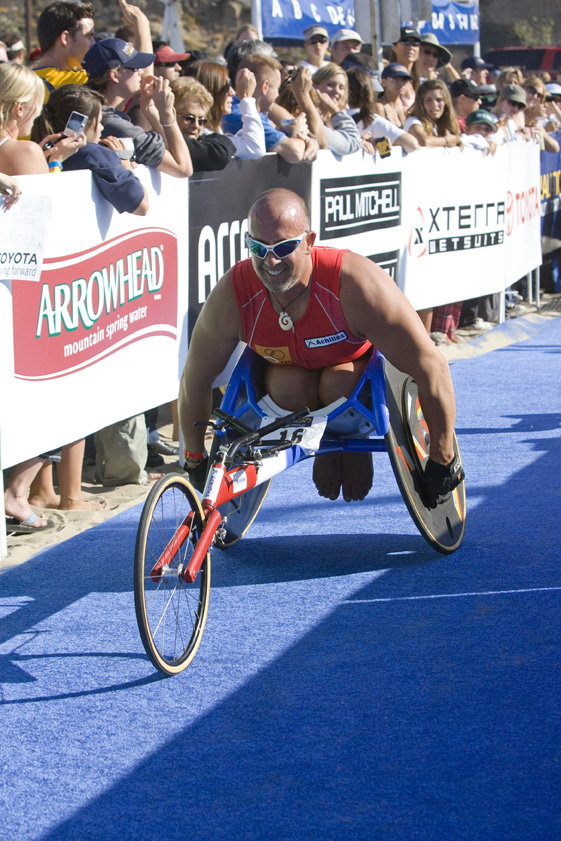 Wheelchair athlete Jeremy Newman competed in the Celebrity Relay at the Nautica Triathlon at Zuma Beach.