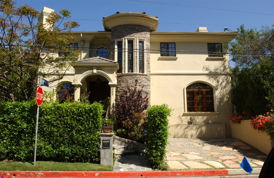 The Department of Building and Safety has revoked the building permits and certificate of occupancy at the principal residence of Mehr and Vickey Beglari.