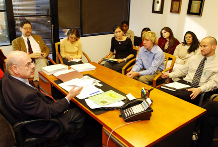 Waxman discusses strategies for stopping the genocide in Darfur with Student Task Force representatives (left to right) Crossroads teacher Tom Laiches, Austin Pick, Sarah Bessell, Sean Meisler, Adam Sterling and (in the back) Lidia Tilahun, Ruth Calvillo, Sasha Pick and Cindy Tringali.