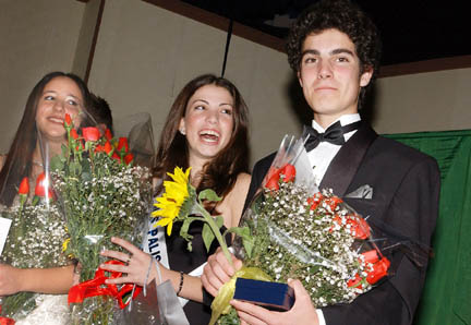 The new Miss Palisades, Gilli Messer, center, and Mr. Palisades Riley Karp after receiving their bouquets and sashes at the event March 17. Miss Palisades runner-up Brittany O'Neil, left, looks on.