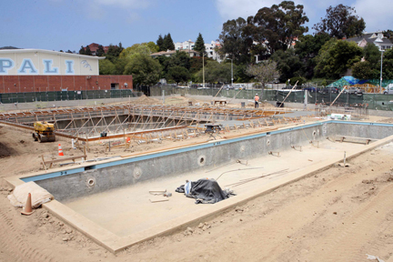 Maggie Gilbert Aquatic Center at Palisades High will have a two-lane teaching pool (foreground) and a 12-lane competition pool (near the gymnasium) when it is completed later this summer.