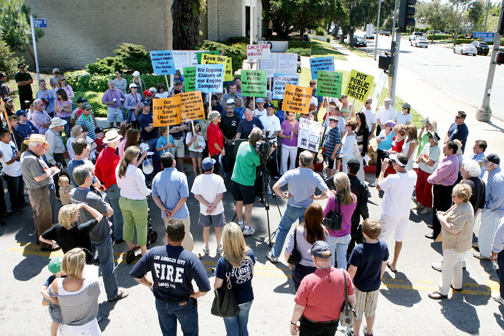 Pacific Palisades residents rallied to protest the closure of Engine 69 at the fire station at Sunset Boulevard and Carey Street in May, arguing that the loss of 12 firefighters would mean inadequate coverage for the community, especially during the fire season. Photo: Rich Schmitt/Staff Photographer