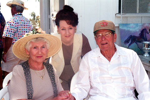 Above: An enthusiastic cowboy, although not a polo player, Ronald Reagan enjoyed watching the Pacific Palisades Chamber of Commerce polo tournament in 1996 with Ruth and Cathie Wishnick (center), Chamber Executive Director Arnie Wishnick's mother and wife. Photo: Marianne Ullerich