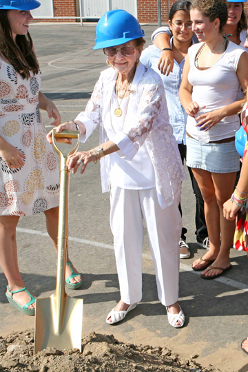 English teacher Rose Gilbert broke ground for the Maggie Gilbert Aquatic Center on August 1, 2008, one day before her 90th birthday, as members of the Palisades High swim team look on.