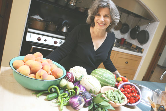 Just home from the Santa Monica Farmers' Market, Amelia Saltsman has peaches, lemons, cauliflower, okra, tomatoes, Persian Bay leaves and a melon to work with.