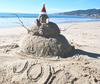 Wendy Anderson and her friend Jacqueline Bourlier had a play date at Will Rogers State Beach, where they built a Christmas sandman.  Photo: Wendy Price Anderson