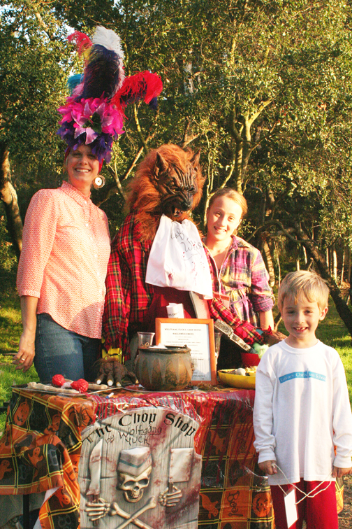 YMCA scarecrow contest originator Cindy Simon poses with the grand-prize winner 