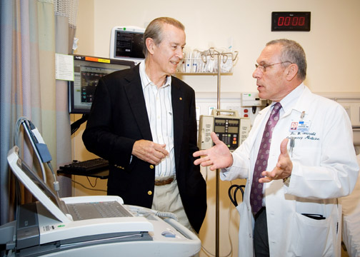 Dr. Wally Ghurabi (right), medical director of the Nethercutt Emergency Center at Santa Monica-UCLA Medical Center, and Jay Smith, who suffered a heart attack last October and credits the Nethercutt team for saving his life.  Photo: Thomas Neerken