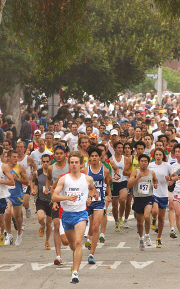 Runners start down Alma Real Drive at the start of last year