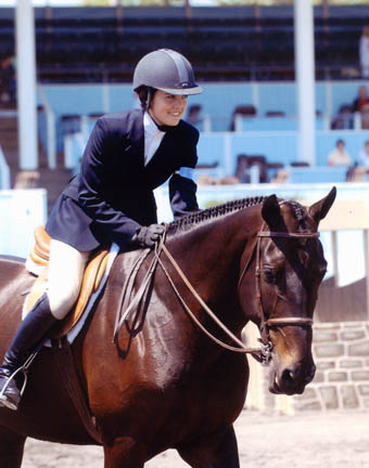 Stephanie Danhakl and her horse In Sync were named Junior Hunter Grand Champions in San Juan Capistrano. Photo: John Danhakl