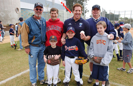 PPBA Commissioner Bob Benton stands with first-pitch throwers (back row, from left) Bill Simon, Jake Steinfeld and Mike Skinner and first-pitch catchers (front row, from left) Neal Conners, Chad Scully and Matt Scully.