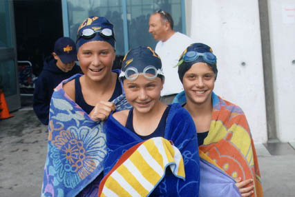 Paly swimmers (from left) Jessica Schem, Alison Merz and Jennifer Tartavull at last weekend's Y Champs Meet in Commerce. Photo: Gayle Kirkpatrick