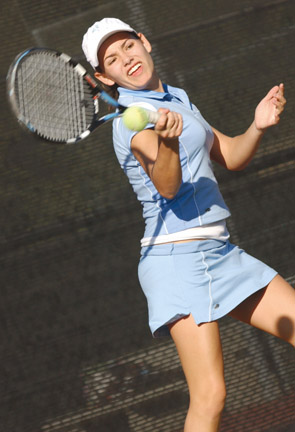 Lotte Kiepe rips a forehand winner during last Wednesday's All-City doubles third-place match. Kiepe and her partner, Mary Logan, won in straight sets.