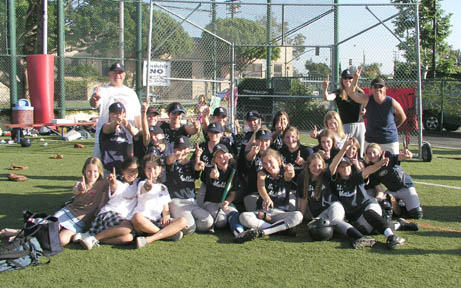 St. Matthew's players celebrate the first softball league championship in school history.