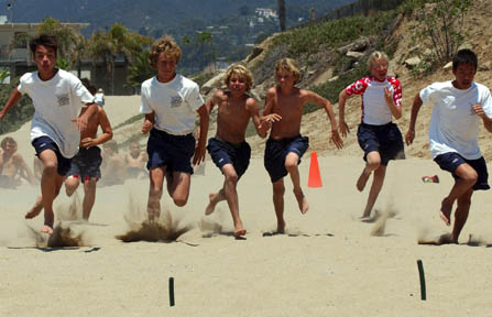 The flag race was one of the most fiercely contested at last Friday's Junior Lifeguards competition at Will Rogers State Beach.