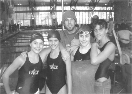 From left: Allison Merz and Jennifer Tartavull, who both swam numerous events in the 12s division at the Pacific Regionals in the City of Commerce, Coach Kameron Kelly, and Shelby Pascoe and Alexandra Edel, who scored plenty of points at last weekend