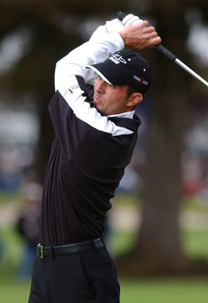 Mike Weir used precise iron shots and nerves of steel to hold off Shigeki Maruyama and win the Nissan Open for the second straight year.