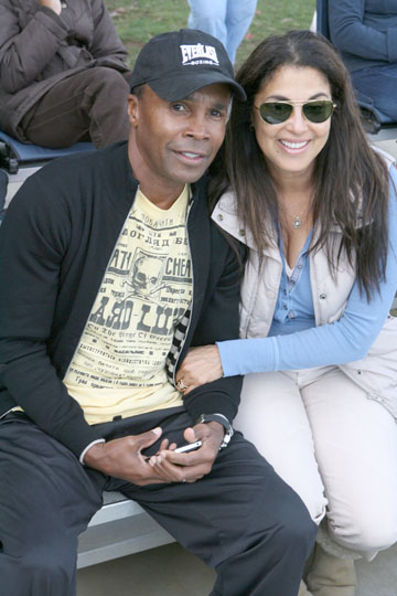 Sugar Ray and Bernadette Leonard watch their son Daniel in Pacific Palisades Baseball Association action. Photo by Rich Schmitt/Staff Photographer