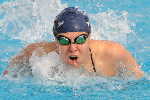 Senior Hannah Kogan swims 100 breaststroke in an exhibition meet against Granada Hills on March 7. Rich Schmitt/Staff Photographer