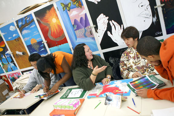 PaliHi art teacher Angelica Pereyra works on the Human Rights Task Force art project with her students, from left, Chris Lee, Jasmine Hutchison, Take Ikuno and Medhat Hanna.