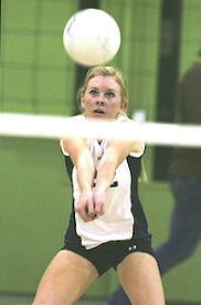 Tait Johnson returns serve in Palisades' state playoff match against Mira Costa. The Dolphins were swept, 25-13, 25-12, 25-15.