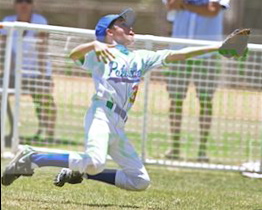 Nick Hurley reaches out to glove a sinking fly ball, one of several stellar catches made by Palisades players throughout the District 2 Pony Playoffs.