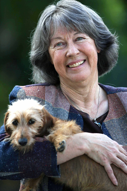 Haldis Toppel with her dog, Sandy, a wirehair dachshund.