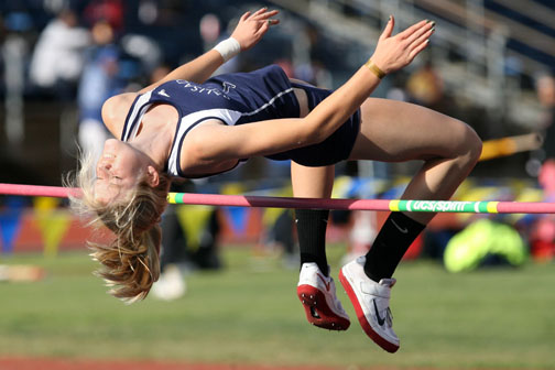 Sophomore Kendall Gustafson, who won the high jump at last Wednesday's meet, clears the bar at last year's City championships. Rich Schmitt/Staff Photographer