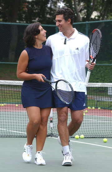 Back at home in Pacific Palisades, Beth Brett and her husband, Adam, visit the tennis courts at the Palisades Recreation Center.