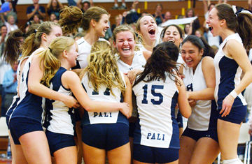 Palisades players celebrate after winning the City Section volleyball championship Saturday night at Occidental College in Eagle Rock.