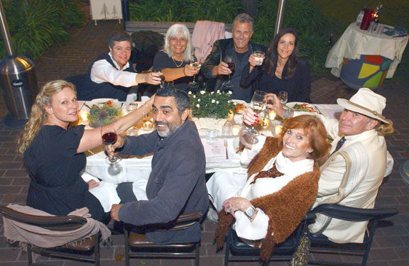 (Left, going clockwise) Yvette Mazboudi, Dr. Howard Lehrhoff, Dr. Nasreen Babu-Khan, Steve and Diana Maiman, John Kelly, Marice McCrory-Irwin and Saad Mazboudi, raise their glasses to toast Diana, who invited them as guests to the Village Green Dinner, which she won in a raffle.